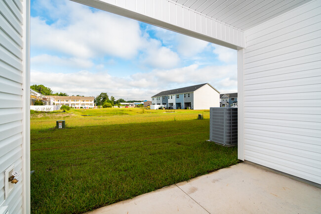 covered patio with green space - 70 Catalina Cir