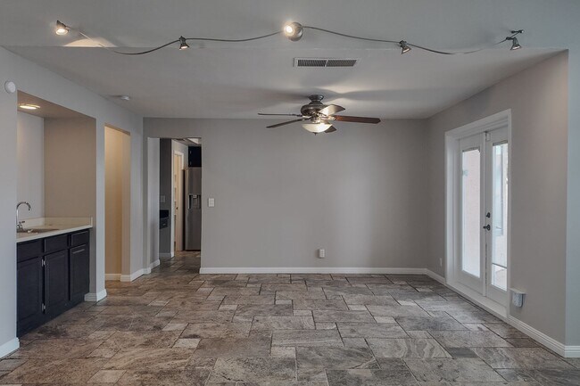 Building Photo - Modern Comfort with Pool & Spa in The Lakes – Solar Equipped Home