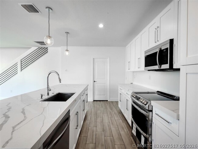 Building Photo - 102-116 NW 41st St