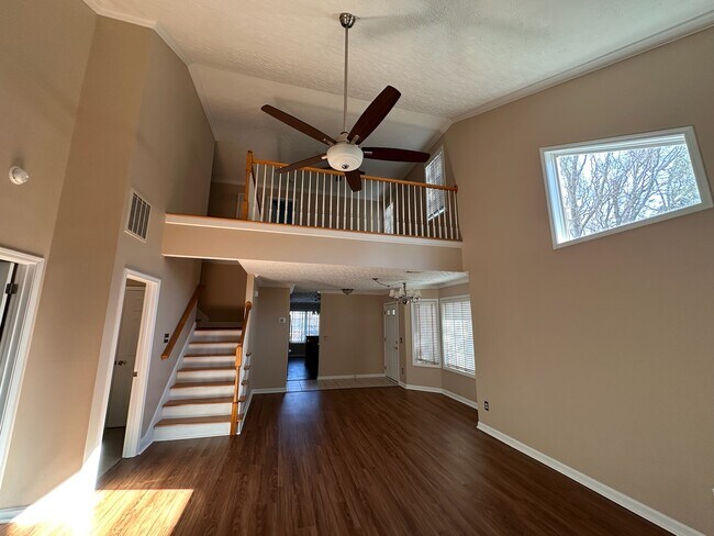 View from living room facing dining area and upstairs loft - 2231 Whitney Ct