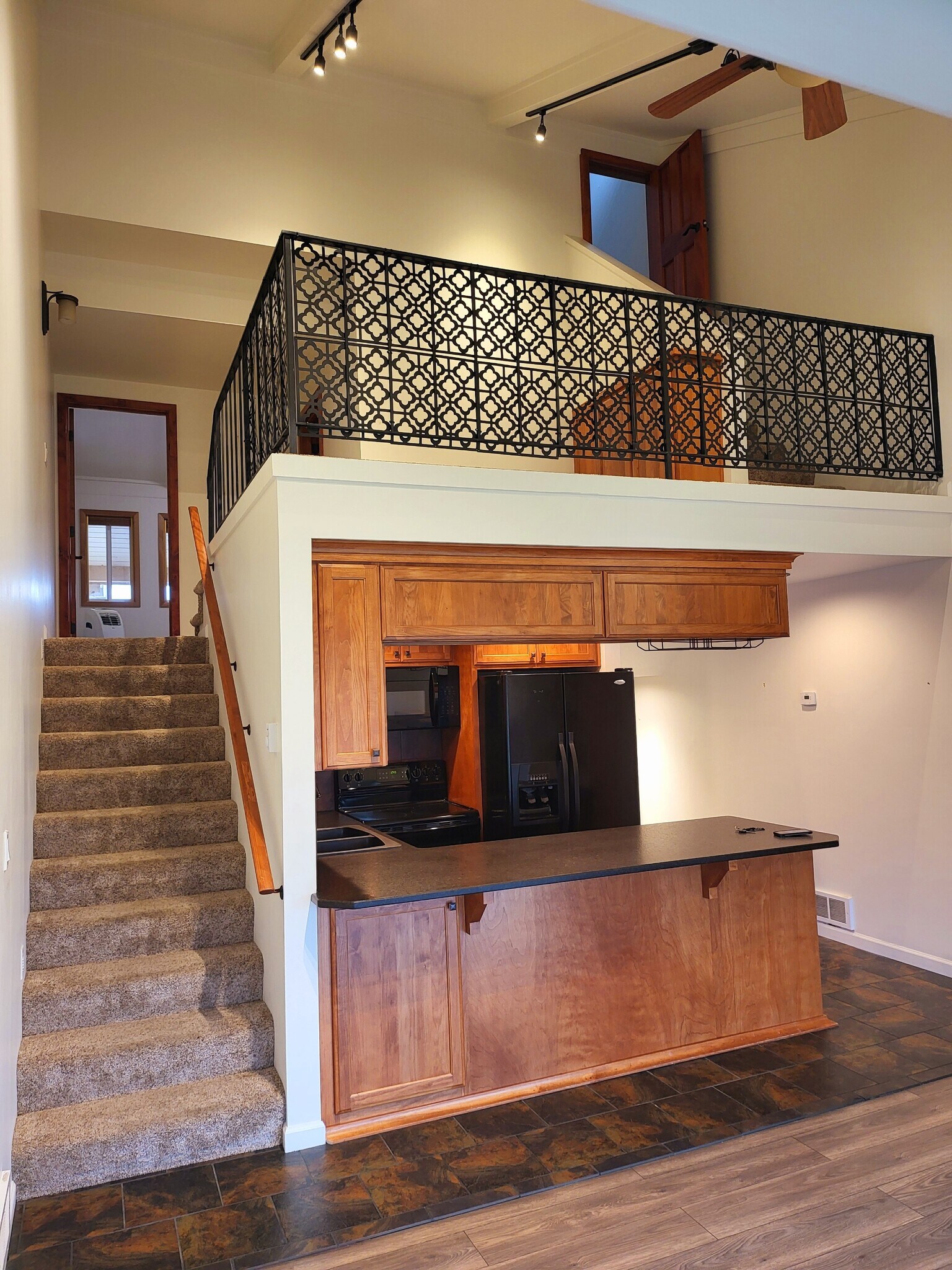 looking into kitchen from living room - 301 Iberian Way