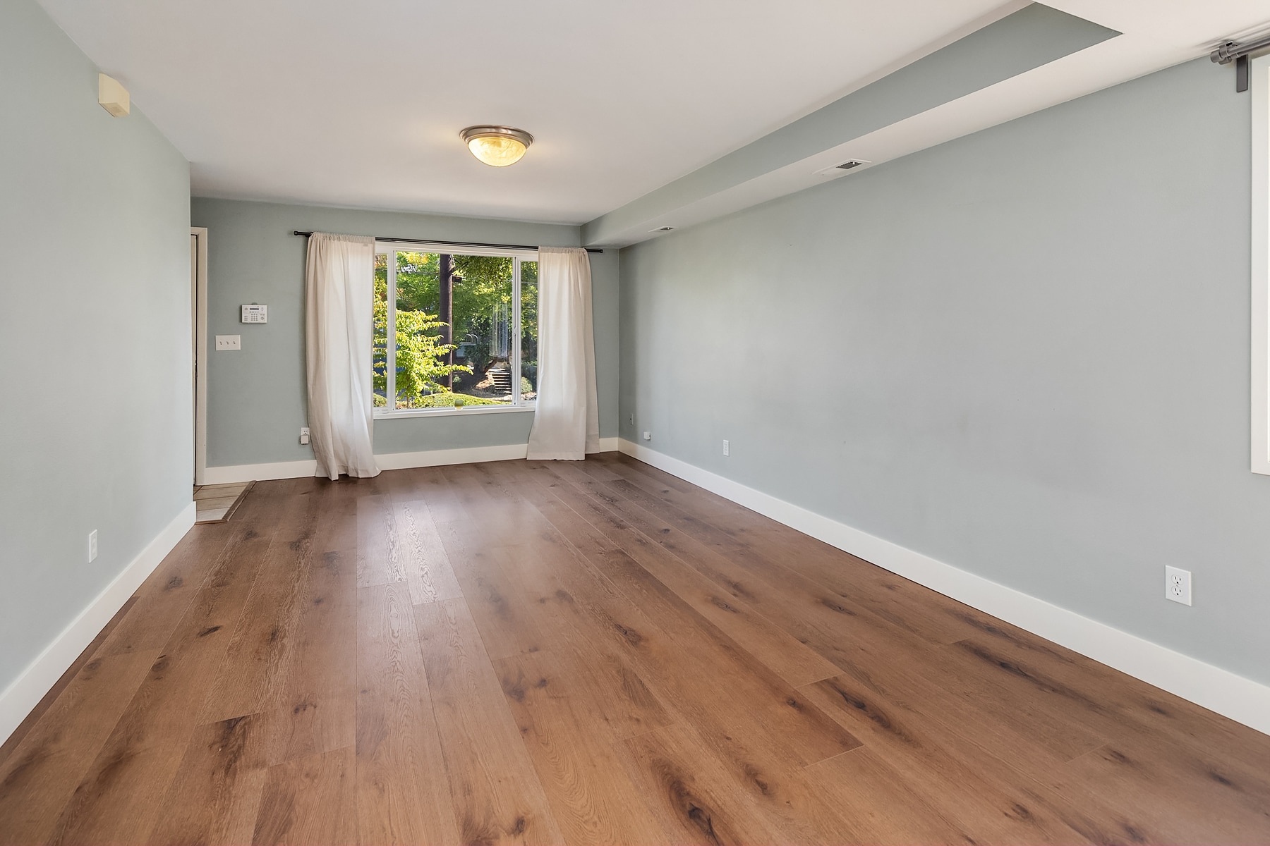 Open Floor Plan with Hardwoods on Main - 7051 8th Ave NW