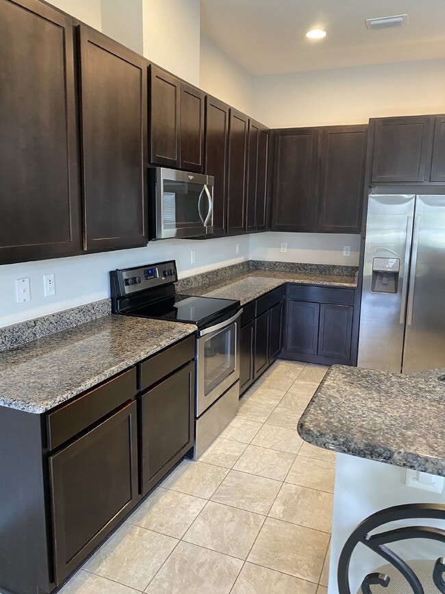 Building Photo - Elegant 4BR Home with Gourmet Kitchen, Smart Tech Package & Nature Views - Coming Soon