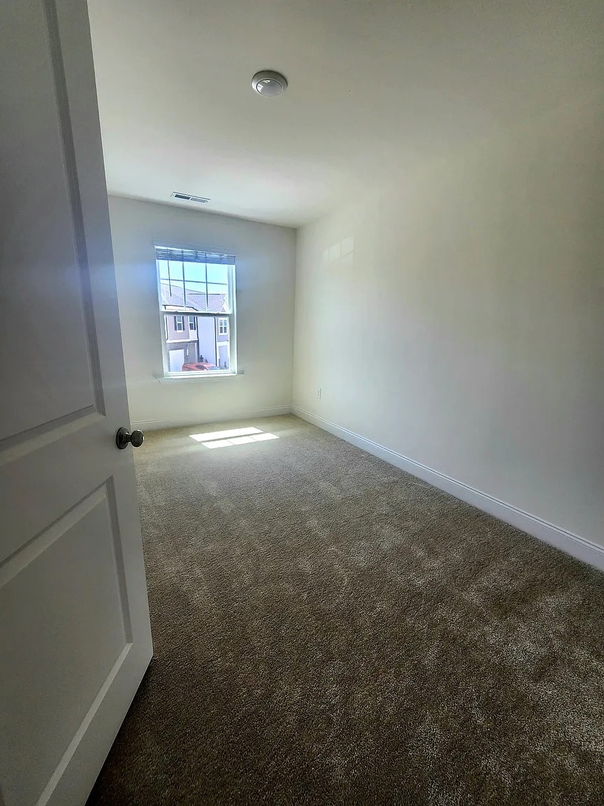 Building Photo - Room in Townhome on Caddis Bnd