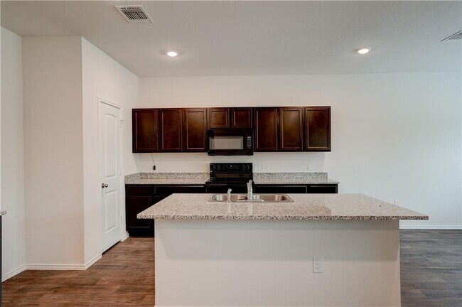 Building Photo - 14500 Fitzgibbon Dr
