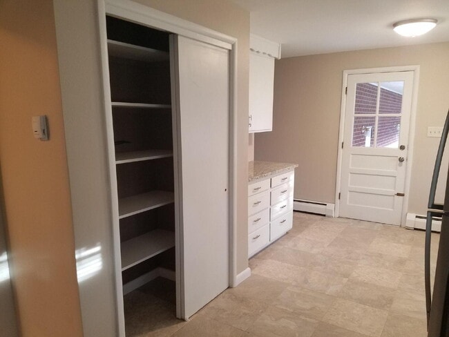 Building Photo - ***AVAILABLE NOW***  Spacious 4-Bedroom Wheat Ridge Home with Finished Garden Level and Two-Car G...