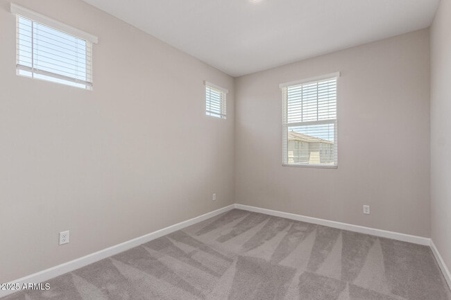 Building Photo - 5835 E Rose Garden Ln