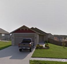 Building Photo - Walk-out basement with a fenced yard!