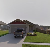 Building Photo - Walk-out basement with a fenced yard!
