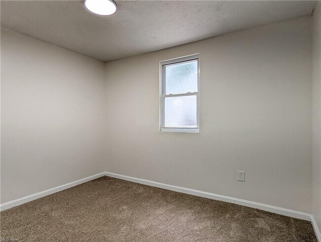 Building Photo - A Fresh Start on a Quiet Street – Everything new for you plus half off first months rent is waiting!