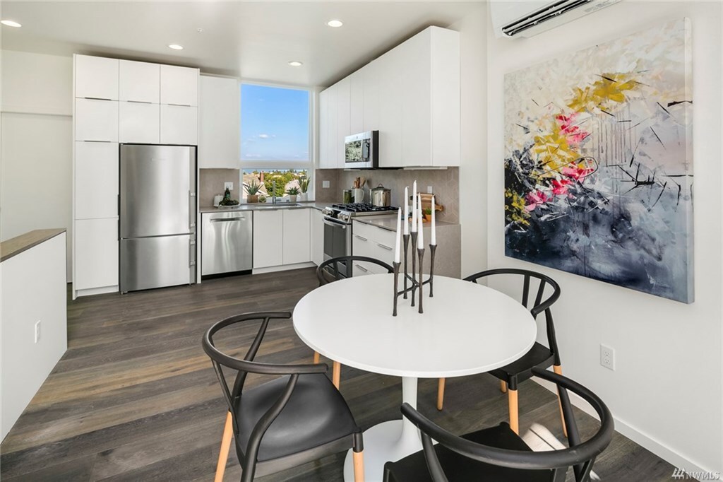 Modern and clean kitchen with powder bath. - 818 N 47th St