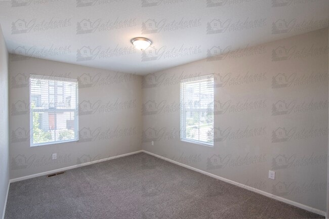 Building Photo - 10294 E 59th Ave