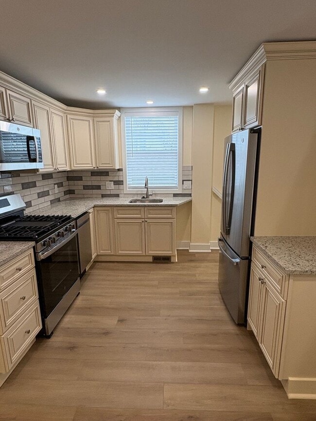 Building Photo - Beautifully Rebuilt Three Bedroom Duplex Near Four Mile Run and I-395