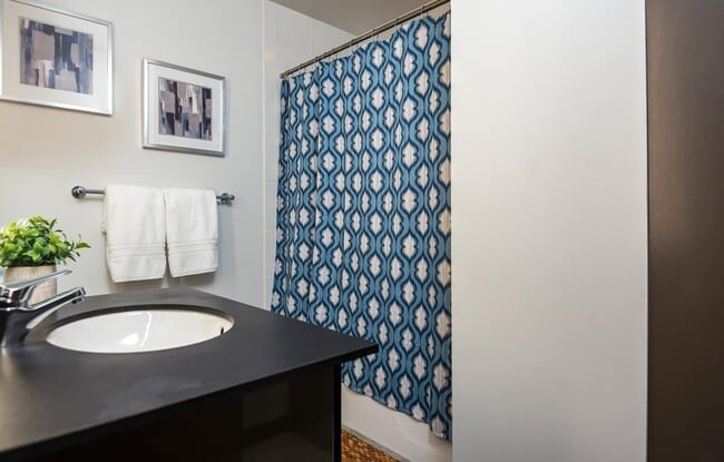 Building Photo - Rare Availability in the Streetcar Lofts, Parking, and Some Utilities Included