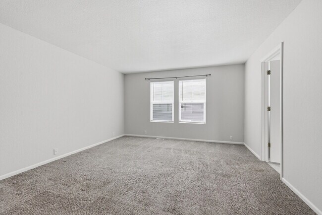 Building Photo - $1,945.95 - 2 Bed, 2.5 Bath Townhome in Colorado Springs with Attached Garage!