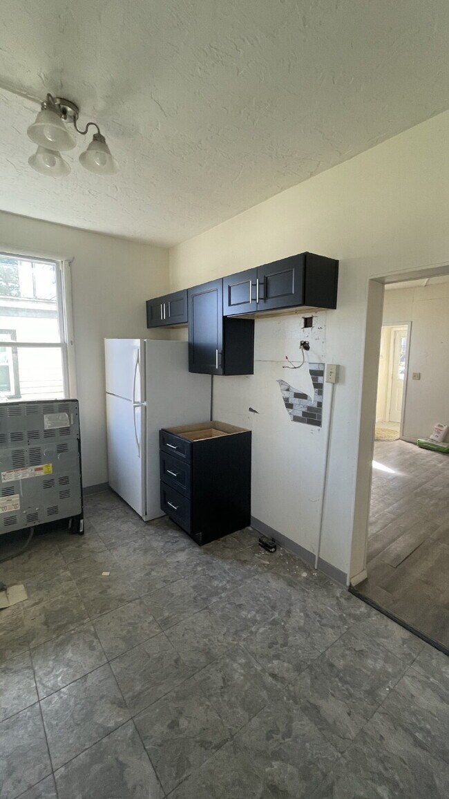 Building Photo - Discover Potential: Prime Location for Your Next Venture at 410-412 Parker Avenue, Scottdale!