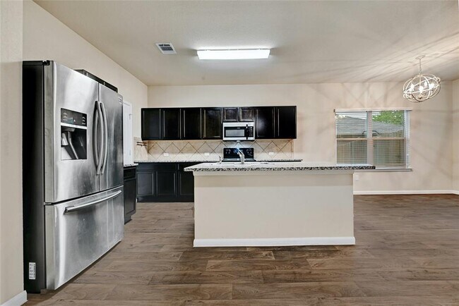 Building Photo - 6301 Wideleaf Dr