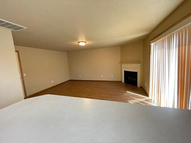 Building Photo - Spacious 4-Bedroom, 2.5-Bath Home with Deck, Fireplace & Updated Kitchen