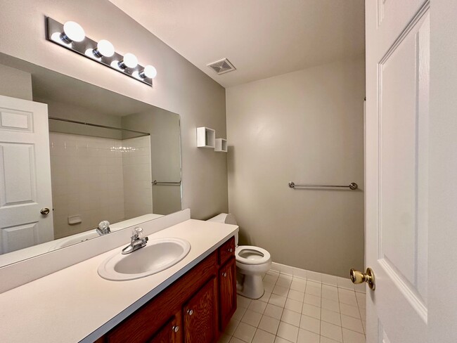 Building Photo - Just Listed! Sun-Filled 2BR Condo with Fireplace & Garage – Won’t Last!