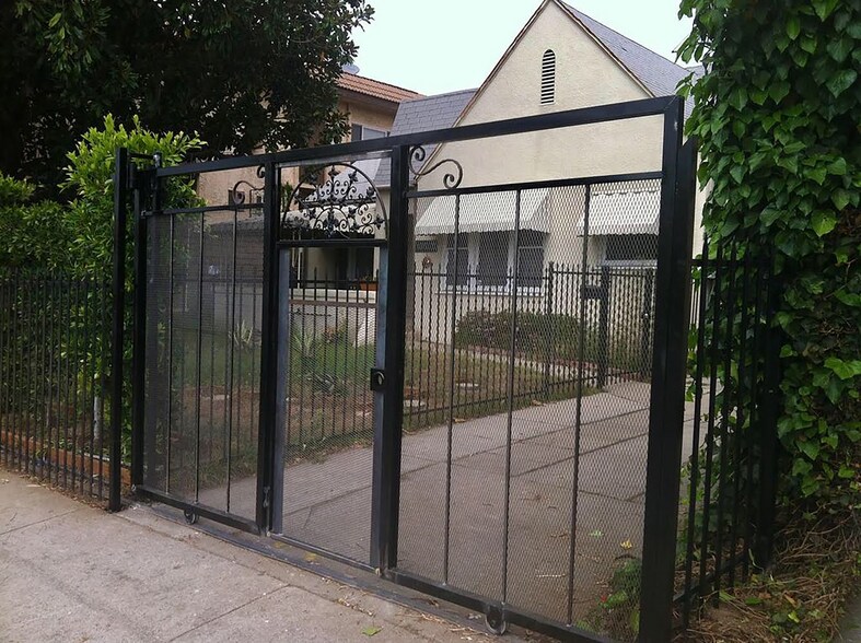 Gated driveway with room for two cars - 13855 Vanowen St