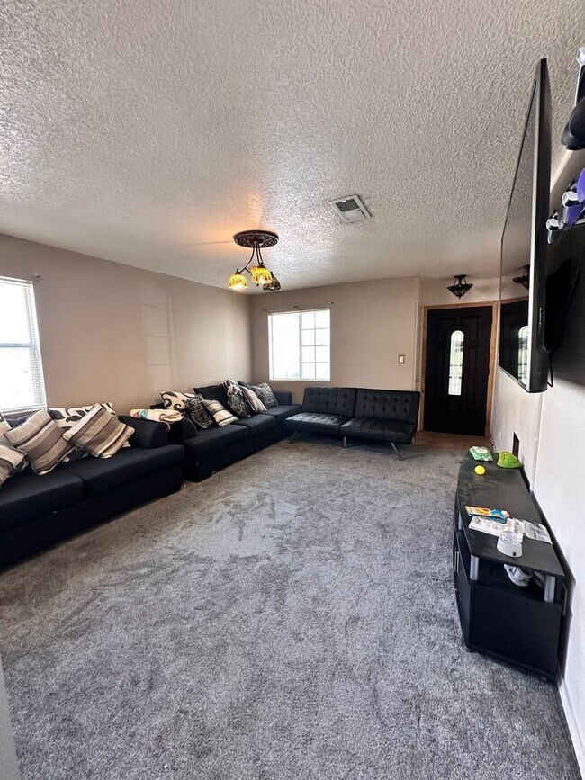 Building Photo - Coming Soon! 5 Bedroom 2.5 Bathroom w/ 2 Car Garage w/ Refrigerated Air