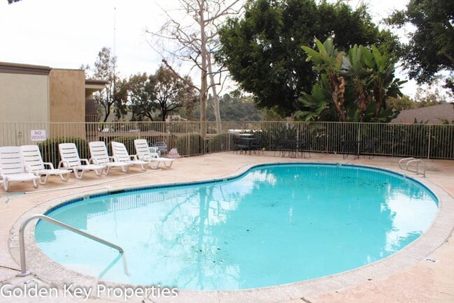 Building Photo - Cozy ground-level unit in the gated commun...