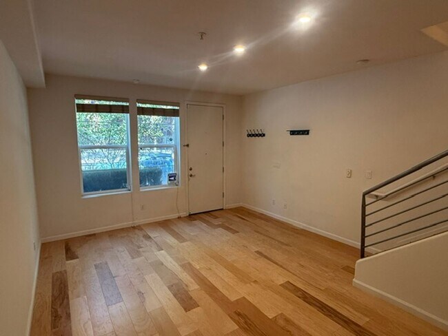 Building Photo - Large 3-Bedroom, 3.5 Bathroom Townhome in Metro Walk Village Neighborhood