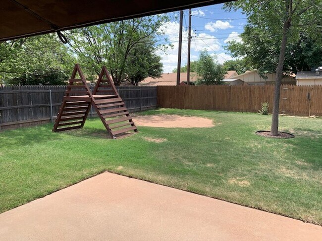 Building Photo - Southwest Lubbock Clean 3/2/2 with nice yard!