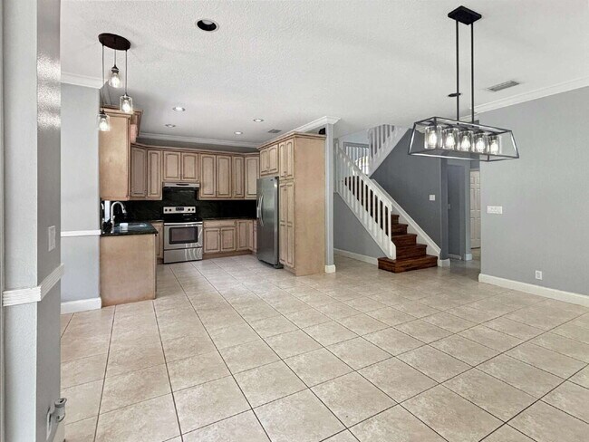 Building Photo - Beautiful 4BR Home in Gated Wellington Shores | Fenced Yard | Resort-Style Amenities