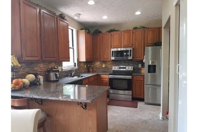 Building Photo - 8590 Laurel Ct