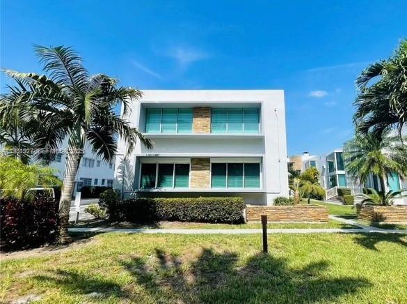 Building Photo - 10178 Collins Ave