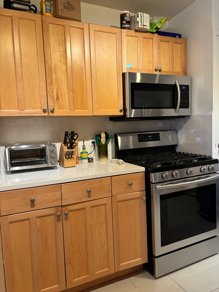 Kitchen - Samsung stainless steel gas range, Samsung Microwave, toaster oven, and fully supplied k, - 5410 Connecticut Ave NW