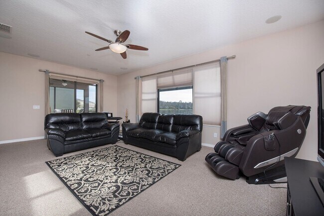 Building Photo - Large, Executive style 3/2.5 Lakefront/POOL Home in East Park of Lake Nona