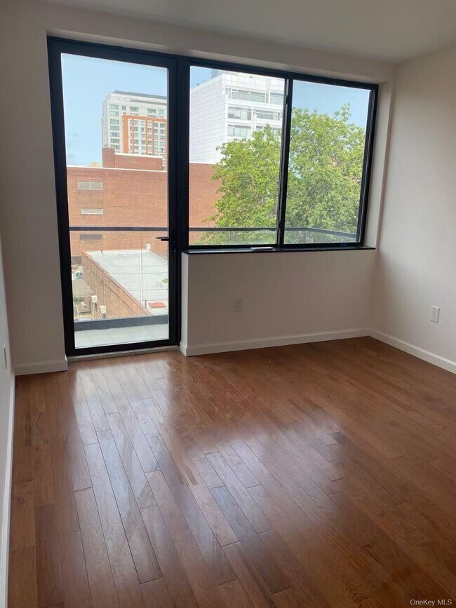 Building Photo - 136-46 41st Ave