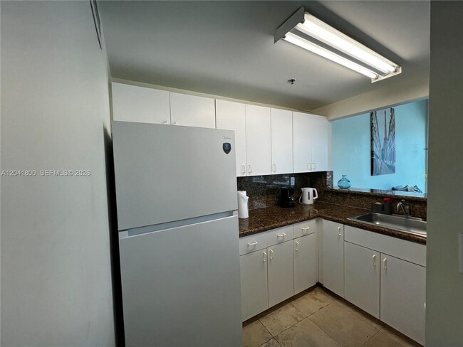 Building Photo - 5445 Collins Ave