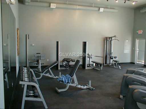 Building Photo - 2nd floor unit in upscale guard gated SW complex near Strip