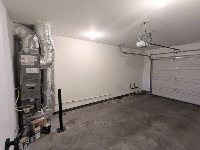 Building Photo - Gorgeous 3x2 townhouse, single-car garage, and two gas fireplaces