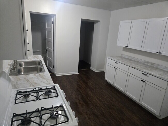 Building Photo - "5-Bedrooms with 2 Full Baths on Olive Street with 1676 sq feet!"