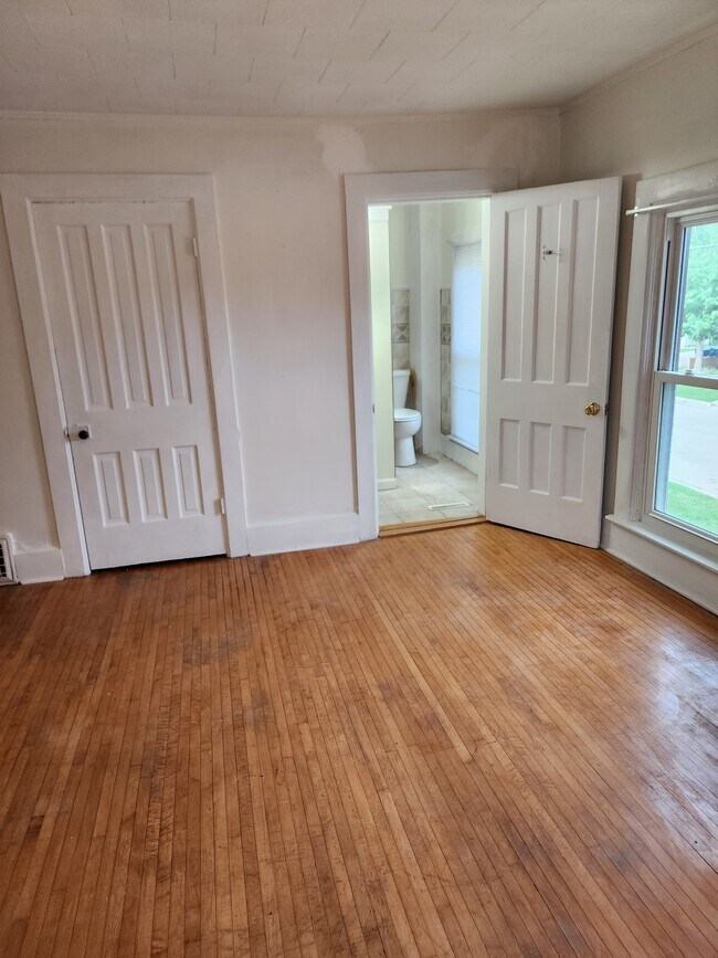 Living Room view into Bath - 403 Cornelia St