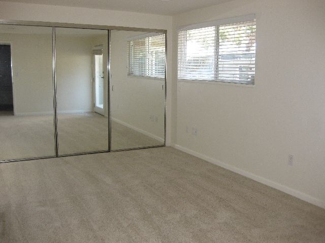 Building Photo - THE BEACH IS YOUR BACKYARD! Light & Bright...