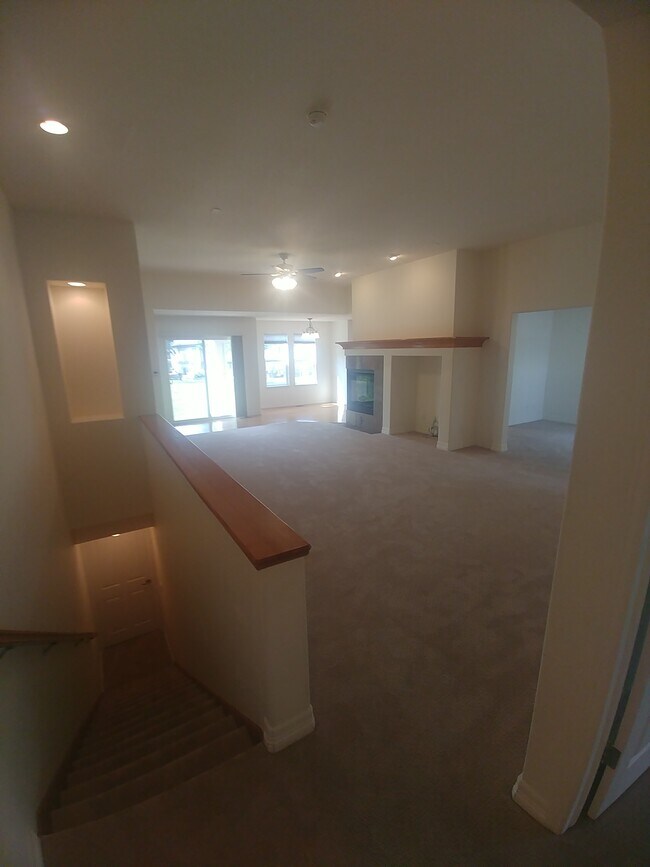 Maine Floor / Basement Stairs - 8322 E 149th Dr