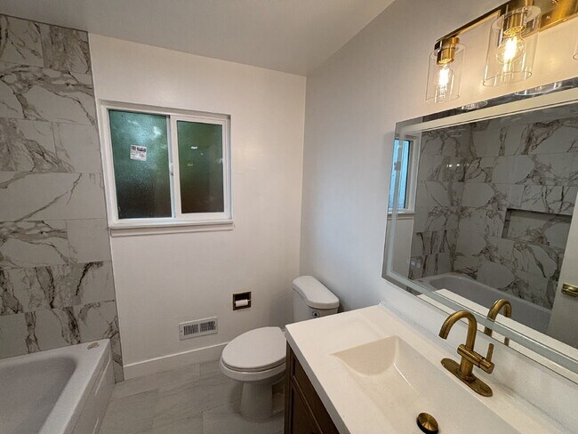 Building Photo - "Completely Remodeled and Charming 3-Bed Oasis with Pool & Fireplace in Pittsburg's Heart!"