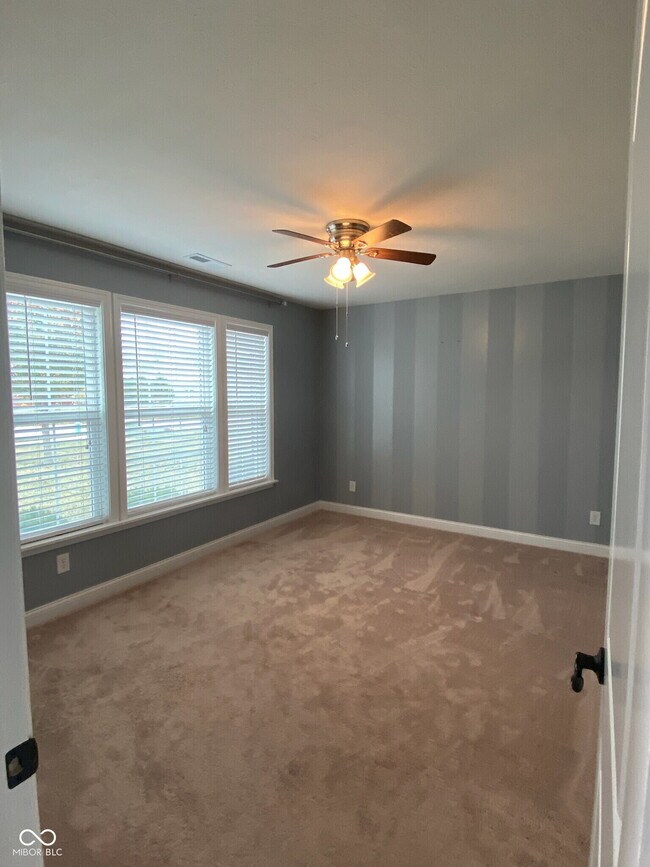 Building Photo - 6750 Woodcrest Dr