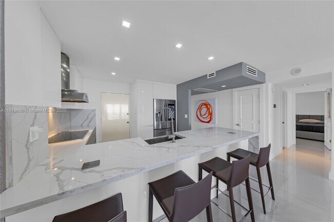 Building Photo - 5555 Collins Ave