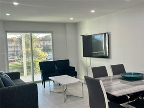 Building Photo - 8595 Sunrise Lakes Blvd