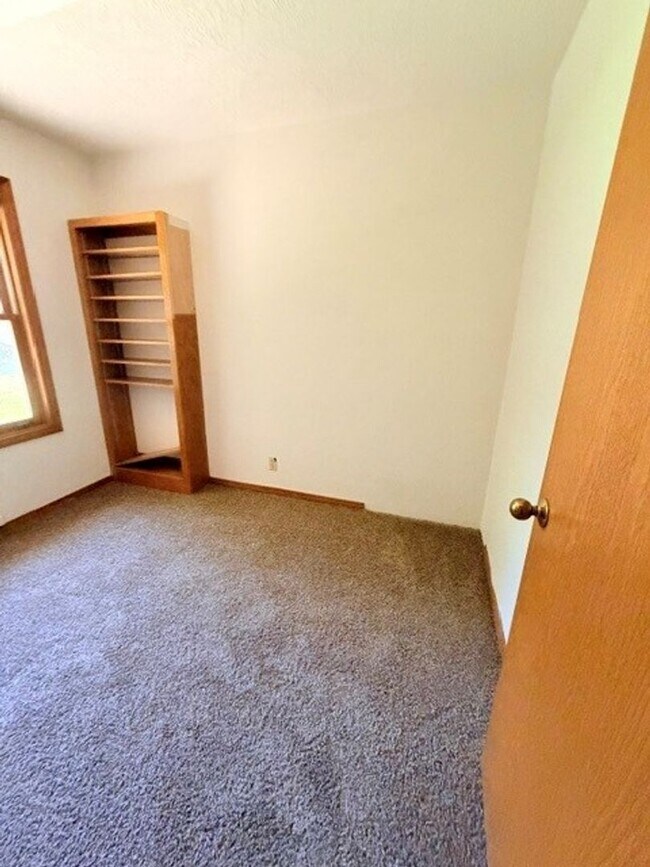 Building Photo - Charming 3-Bedroom Home with Garage & Lawn Care Included