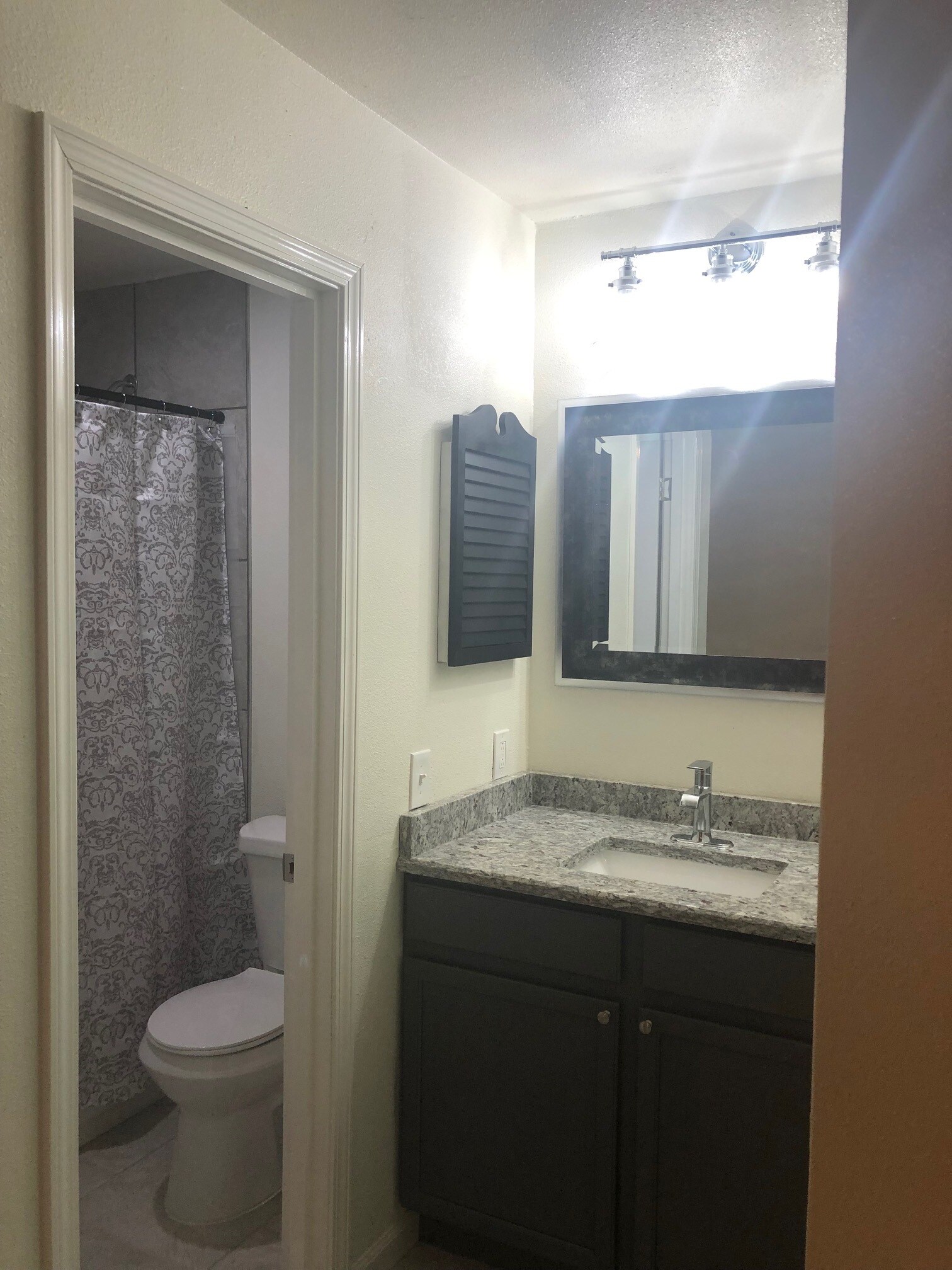 Master bedroom vanity, sink and private restroom, tub/shower combo - 9207 Cliff Way St