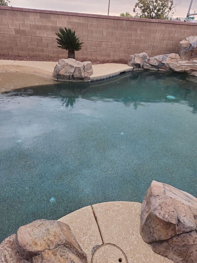 Building Photo - A Stunning 4 Bedroom Home with a Sparkling Pool