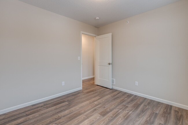 Building Photo - Newer Construction for RENT 3bd 3ba 2 car attached garage END UNIT available Jan 2026