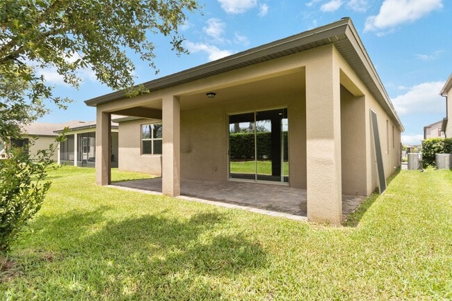 Building Photo - Gorgeous Energy Efficient 4/2 Home in Gated Community Close to Lake Nona